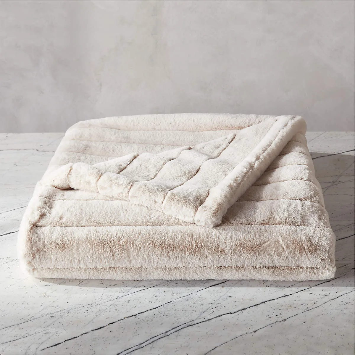 CHANNEL SALUTE FAUX FUR THROW